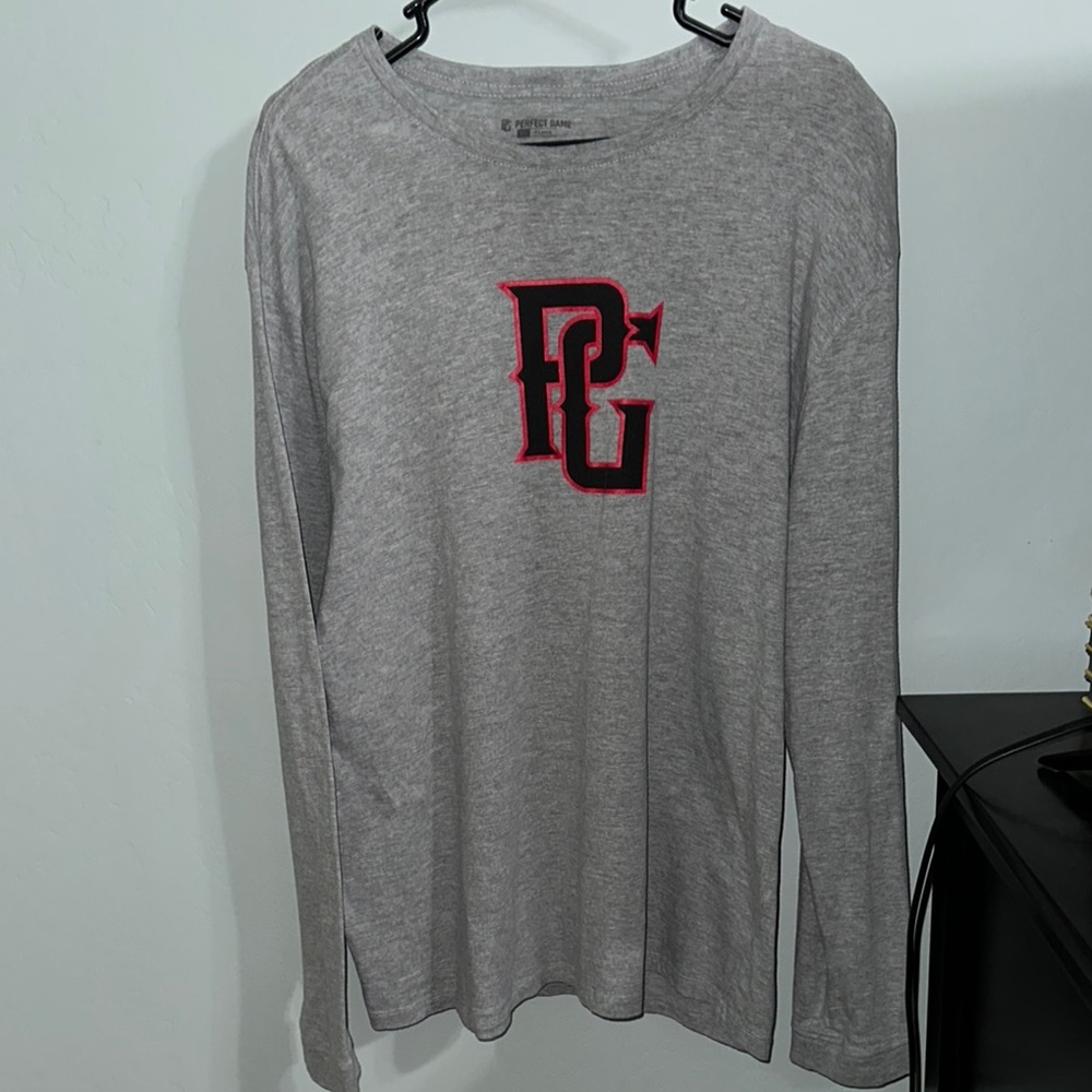 Perfect game size XL Gray Long Sleeve Shirt with Red and black Logo